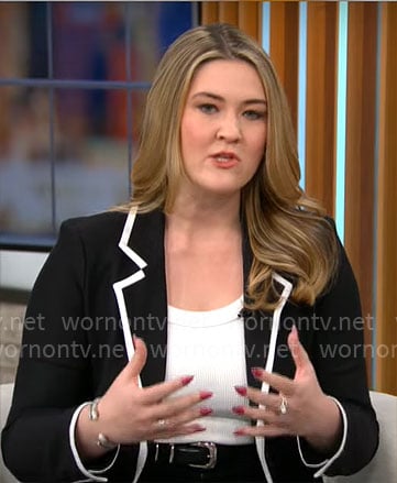 Ashley Sharp’s black blazer with white trims on CBS Mornings