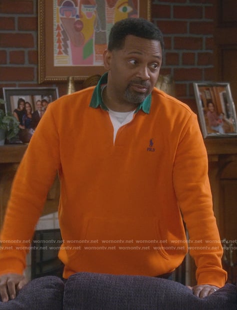 Bennie's orange contrast polo sweater on The Upshaws