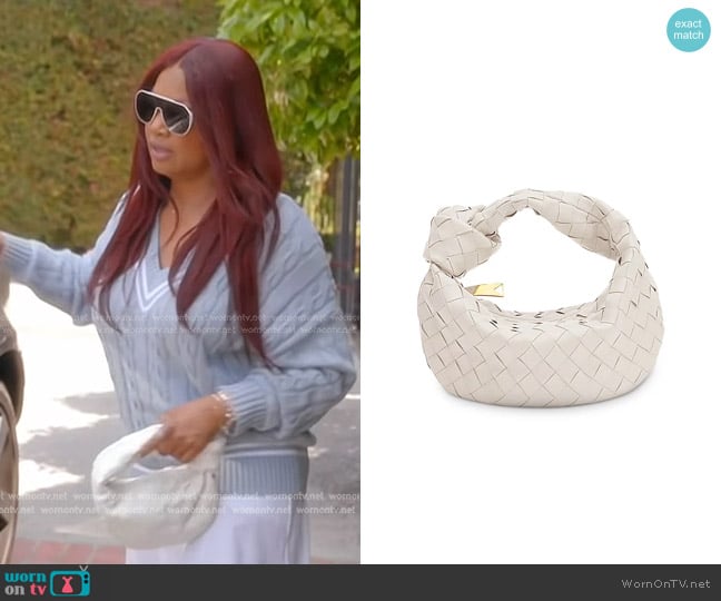 Garcelle’s white knot bag on RHOBH