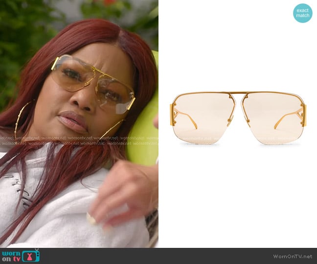 Bottega Veneta Triangle Pilot Sunglasses in Shiny Gold worn by Garcelle Beauvais on The Real Housewives of Beverly Hills