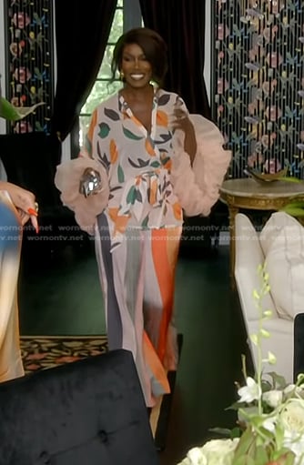 Bozoma's floral wrap blouse and striped pants on The Real Housewives of Beverly Hills