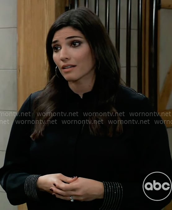 Brook Lynn’s black blouse with metallic stripe cuffs on General Hospital