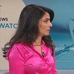 Celine Gounder’s pink satin button down shirt on CBS Mornings