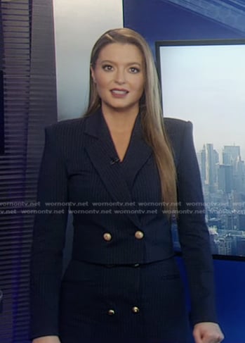 Dani’s navy pinstripe cropped blazer and skirt on Good Morning America