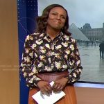 Deborah’s black floral blouse and brown ombre pleated skirt on Good Morning America