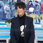 Diane Warren’s black Snoopy sweater and sneakers on Today