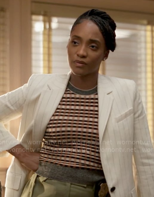 Faith's white pinstripe blazer and checked knit top on Will Trent