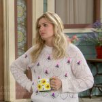 Gemma’s white floral embroidered sweater on The Neighborhood