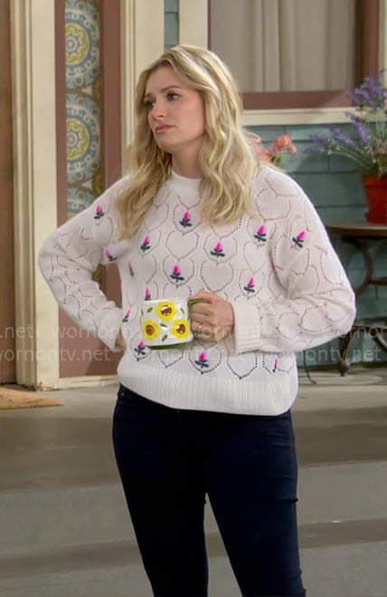 Gemma's white floral embroidered sweater on The Neighborhood