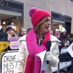 Hoda’s white coat and two-tone knit scarf on Today