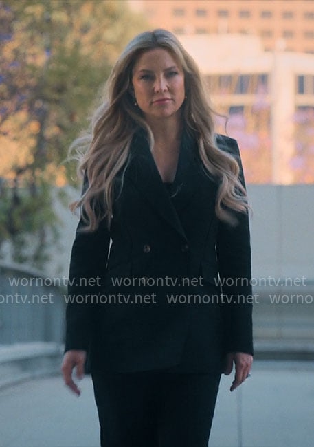 Isla's black suit on Running Point