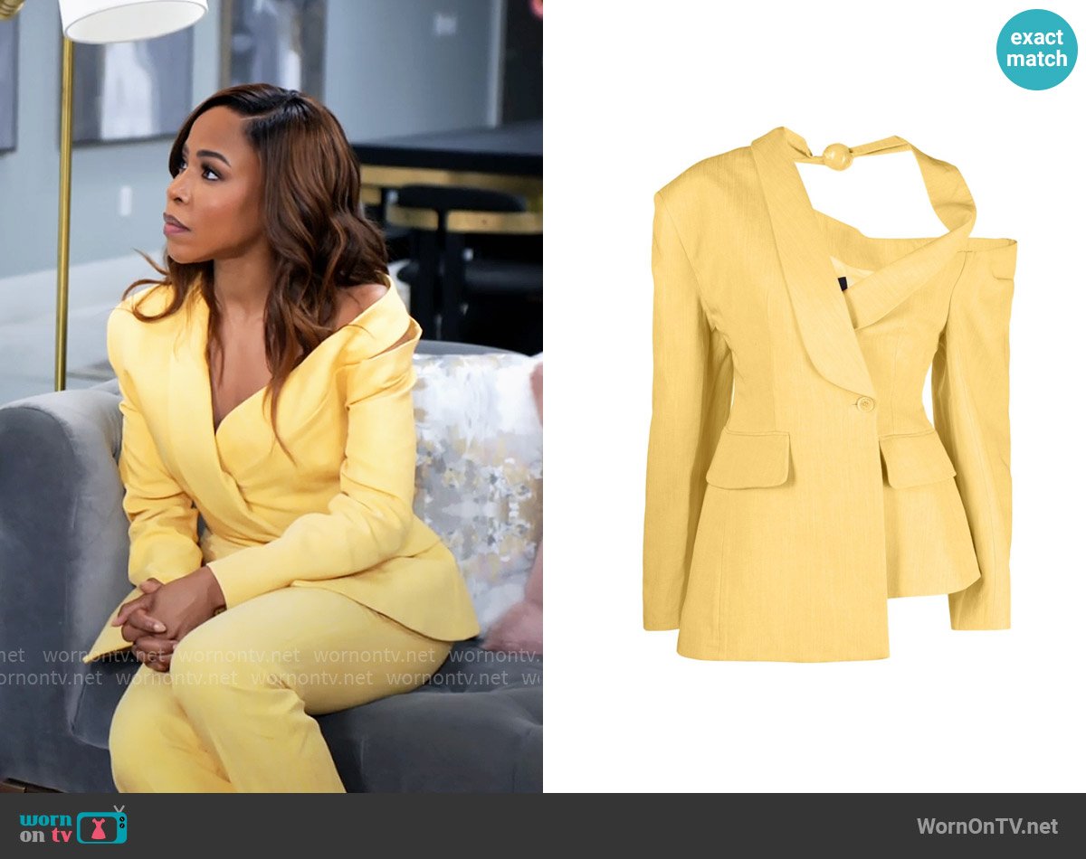 Andi’s yellow asymmetric off-shoulder jacket on Tyler Perrys Sistas