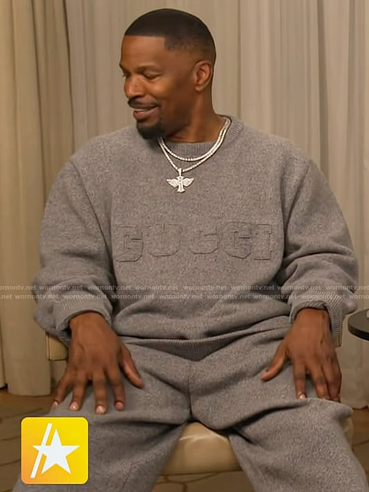 Jamie Foxx’s gray Gucci embroidered sweatshirt on Access Hollywood