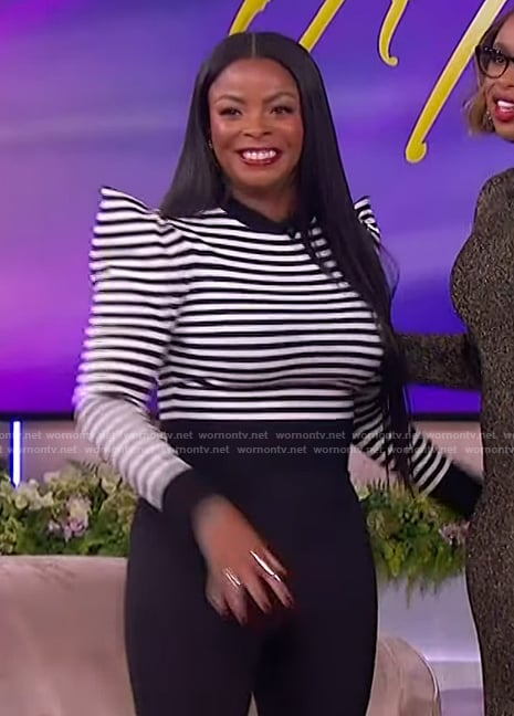 Janelle James's stripe pointed shoulder top on The Jennifer Hudson Show