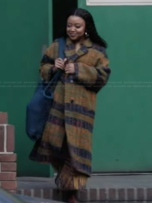 Janine's plaid coat on Abbott Elementary