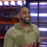 Jharrel Jerome’s colorblock check knit sweater on The Kelly Clarkson Show