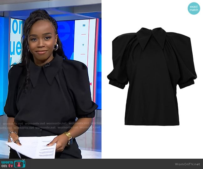 Zinhle’s black collared blouse on NBC News Daily Zinhle’s black collared blouse on NBC News Daily