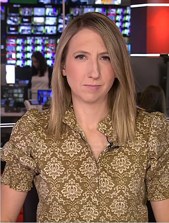 Julia Ainsley’s beige floral dress on NBC News Daily