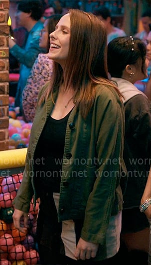 Kimberly’s green buttoned jacket on The Sex Lives of College Girls