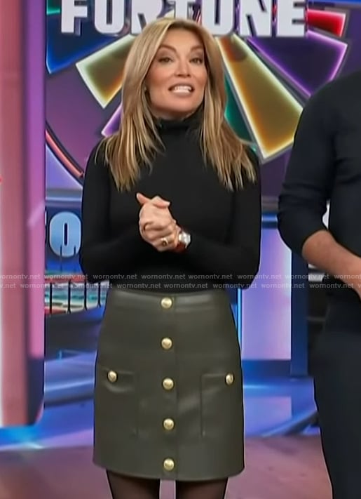 Kit’s green leather mini skirt on Access Hollywood