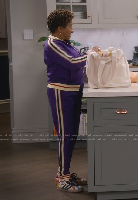 Lucretia's purple sleeve stripe tracksuit on The Upshaws