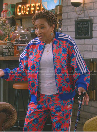 Lucretia's red and blue print track jacket and pants on The Upshaws