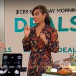 Michelle Miller’s navy and orange floral print dress on CBS Mornings