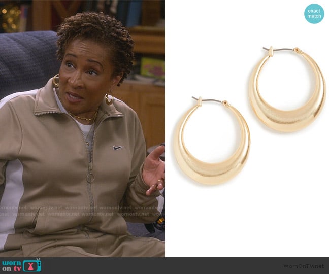 Madewell Large Crescent Hoop Earrings worn by Lucretia Turner (Wanda Sykes) on The Upshaws