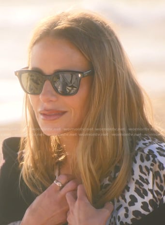 Dorit's black sunglasses on The Real Housewives of Beverly Hills