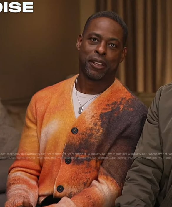 Sterling K. Brown’s orange tie dye cardigan on Access Hollywood