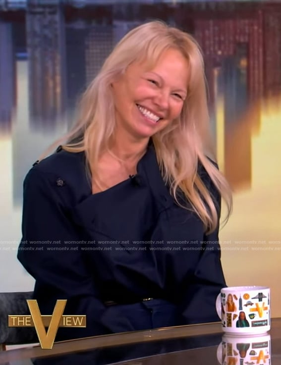 Pamela Anderson’s navy button detail blouse and pants on The View