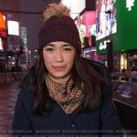 Emilie’s navy down coat and purple knit beanie on Today