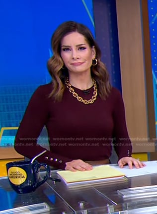 Rebecca’s burgundy button sleeve sweater on Good Morning America