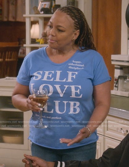 Regina's blue Self Love Club print tee on The Upshaws