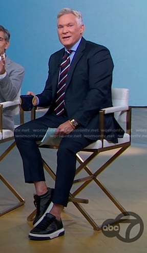 Sam Champion's black sneakers on Good Morning America