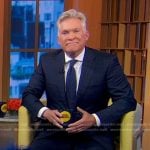 Sam Champion’s black sneakers with white sole on Good Morning America