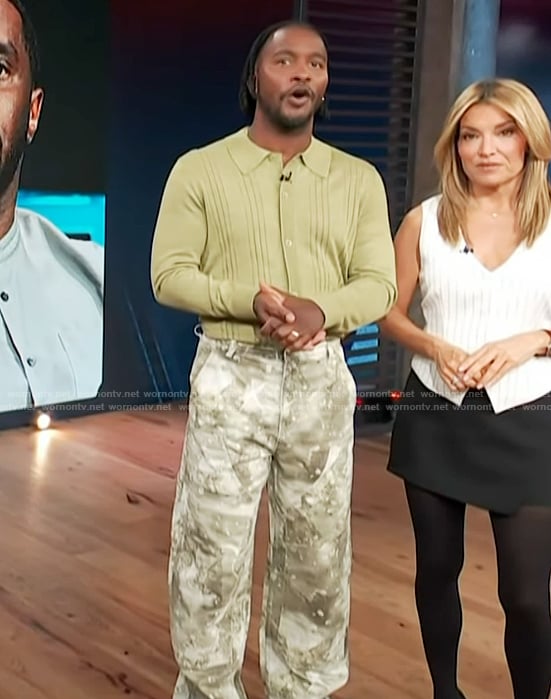 Scott’s green knit sweater and camo print pants on Access Hollywood