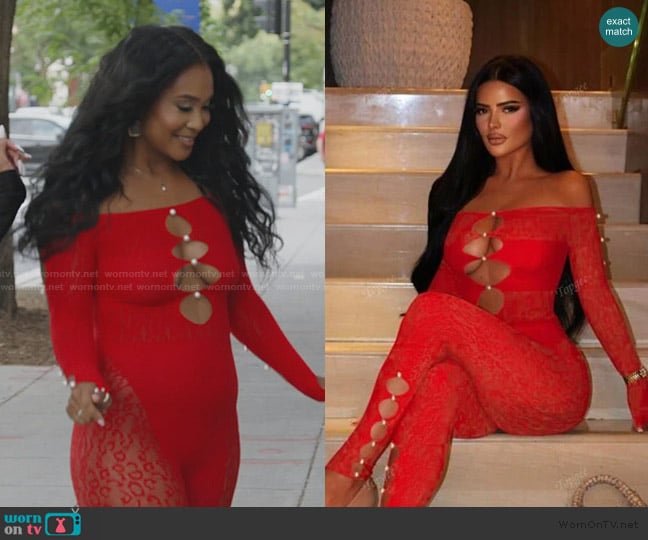 Jacqueline’s red lace cutout jumpsuit on RHOP