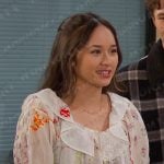 Sophia’s white floral print blouse on Days of our Lives