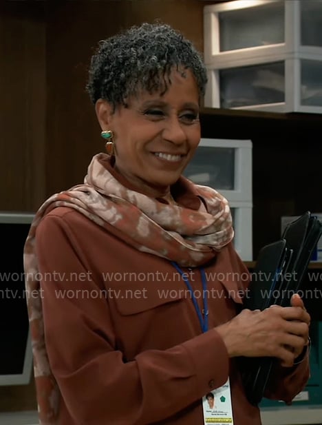 Stella's rust brown button down shirt and printed scarf on General Hospital