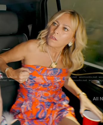 Sutton’s orange floral strapless romper on The Real Housewives of Beverly Hills