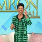 Tamron’s green knit dot print cardigan and dress on Tamron Hall Show