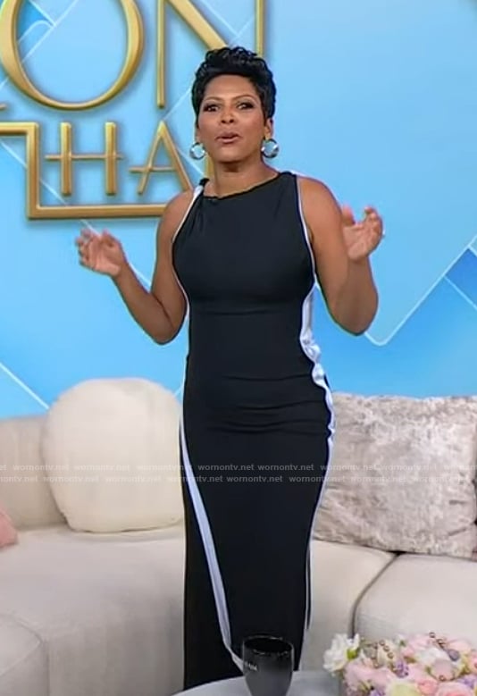 Tamron's navy sleeveless dress on Tamron Hall Show