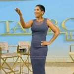 Tamron’s blue sheer top and ruffle hem skirt on Tamron Hall Show