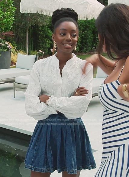 Venita’s white embroidered blouse and denim mini skirt on Southern Charm