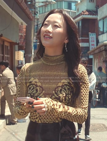 Yuri's yellow floral print long sleeve top on XO Kitty