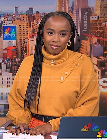 Zinhle’s orange turtleneck sweater on NBC News Daily