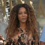 Zuri’s black paisley print blouse on Access Hollywood