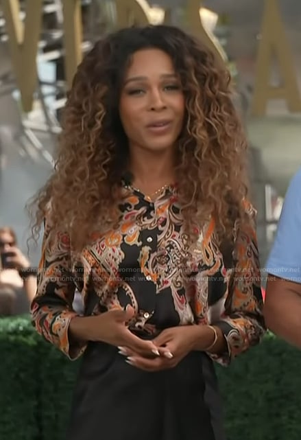 Zuri's black paisley print blouse on Access Hollywood