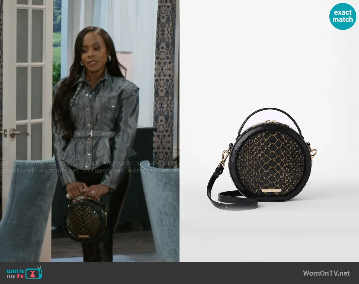 Brahmin Lane Bag in Black Cavatica worn by Hayley Lawson (Marquita Goings) on Beyond the Gates